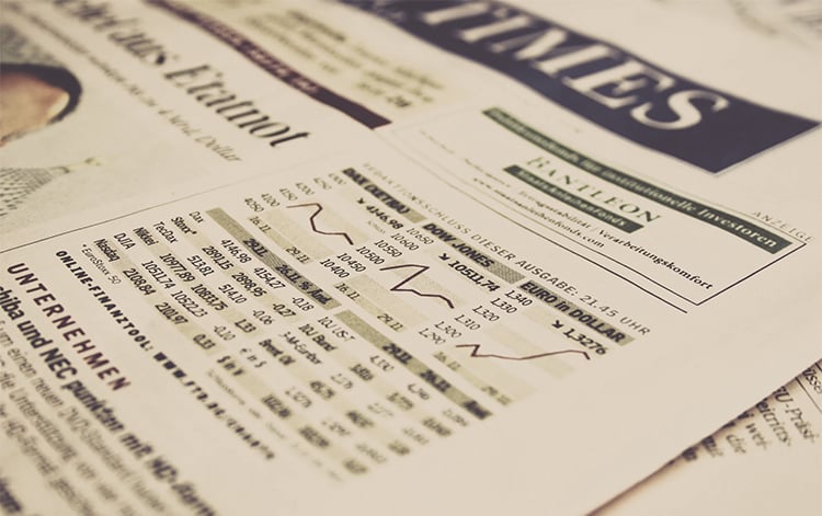 newspaper snapshot on currency rate fluctuation