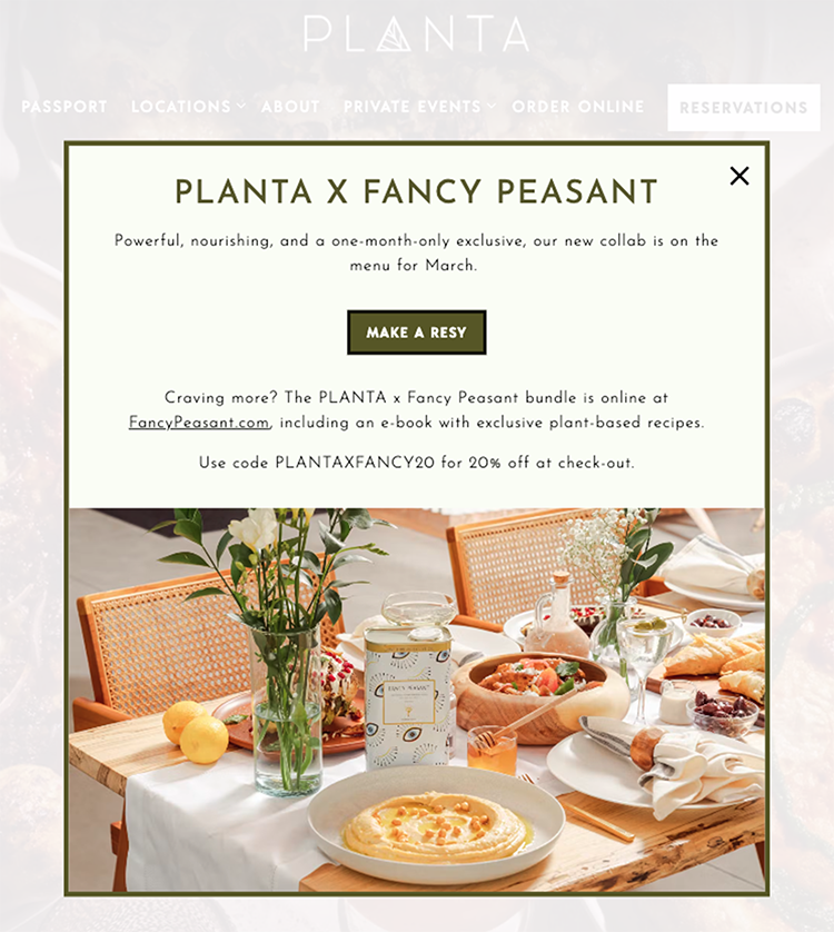 Advertisement for PLANTA x Fancy Peasant collaboration featuring a table set with a plant-based meal. Text offers a 20% discount with code PLANTAXFANCY20 and mentions an exclusive e-book with recipes.