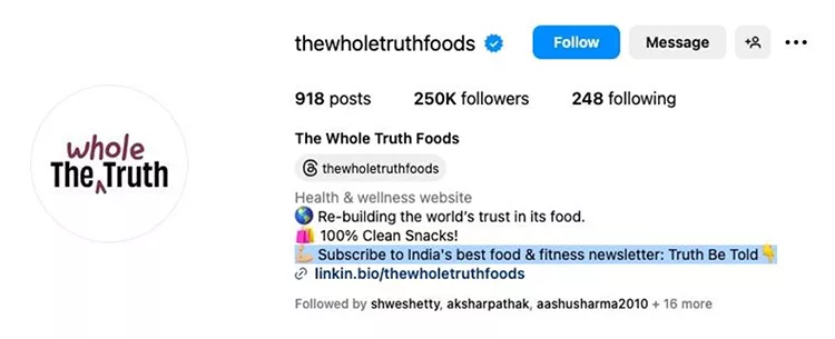 Instagram profile of The Whole Truth Foods, a health and wellness website, showcasing a banner with 250K followers, 248 following, and promoting clean snacks and a newsletter subscription.