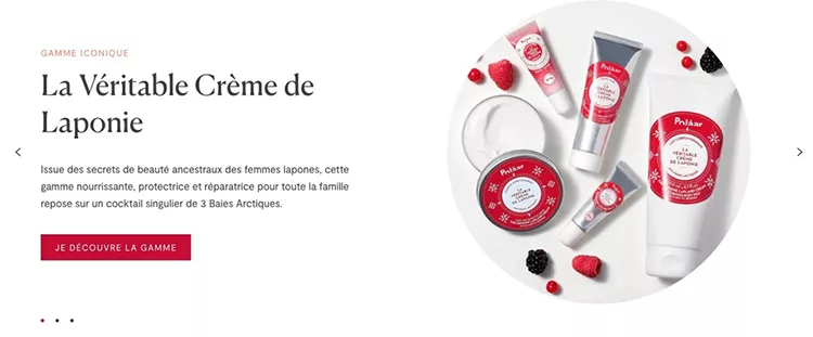 A range of skincare products labeled "La Véritable Crème de Laponie" displayed alongside berries. French text highlights the nourishing and protective qualities of the products.