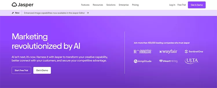 Screenshot of Jasper's webpage: "Marketing revolutionized by AI" on a purple background, with a call-to-action for a free trial or demo, and logos of companies using the service like Amplitude and Ulta.