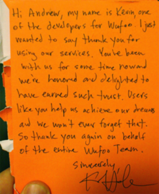 Handwritten note on orange paper expressing gratitude to "Andrew" from a developer named "Kevin" at Wufoo for using their services and helping achieve their goals, signed sincerely by Kevin.